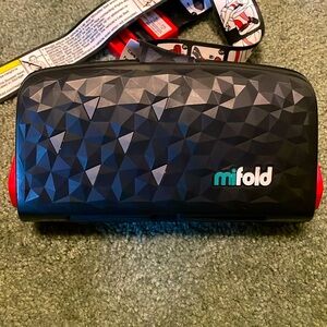 Mifold.  rare find!  Used for one travel trip… like new condition.